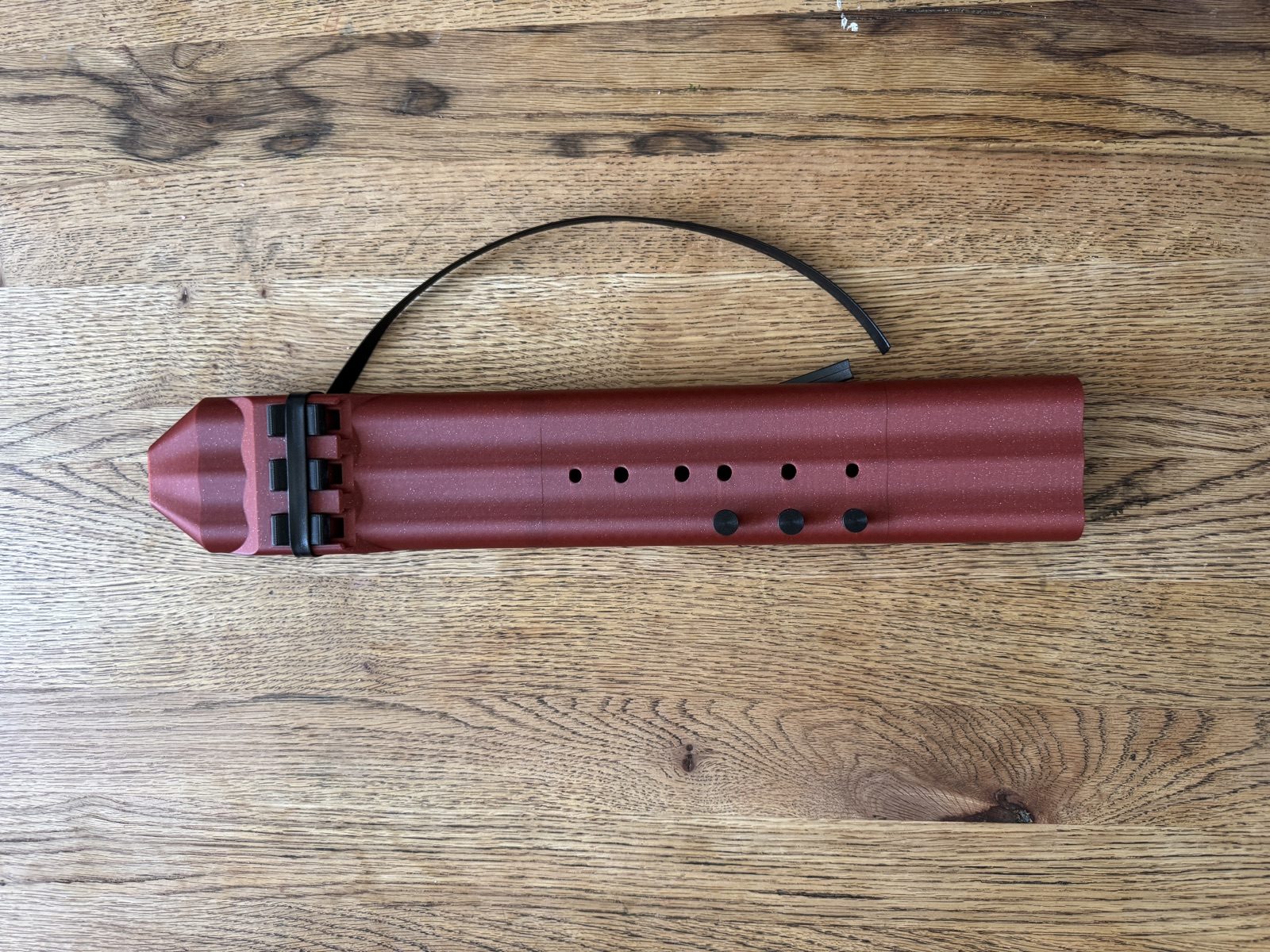 Crimson triple drone flute in the key of A, top view