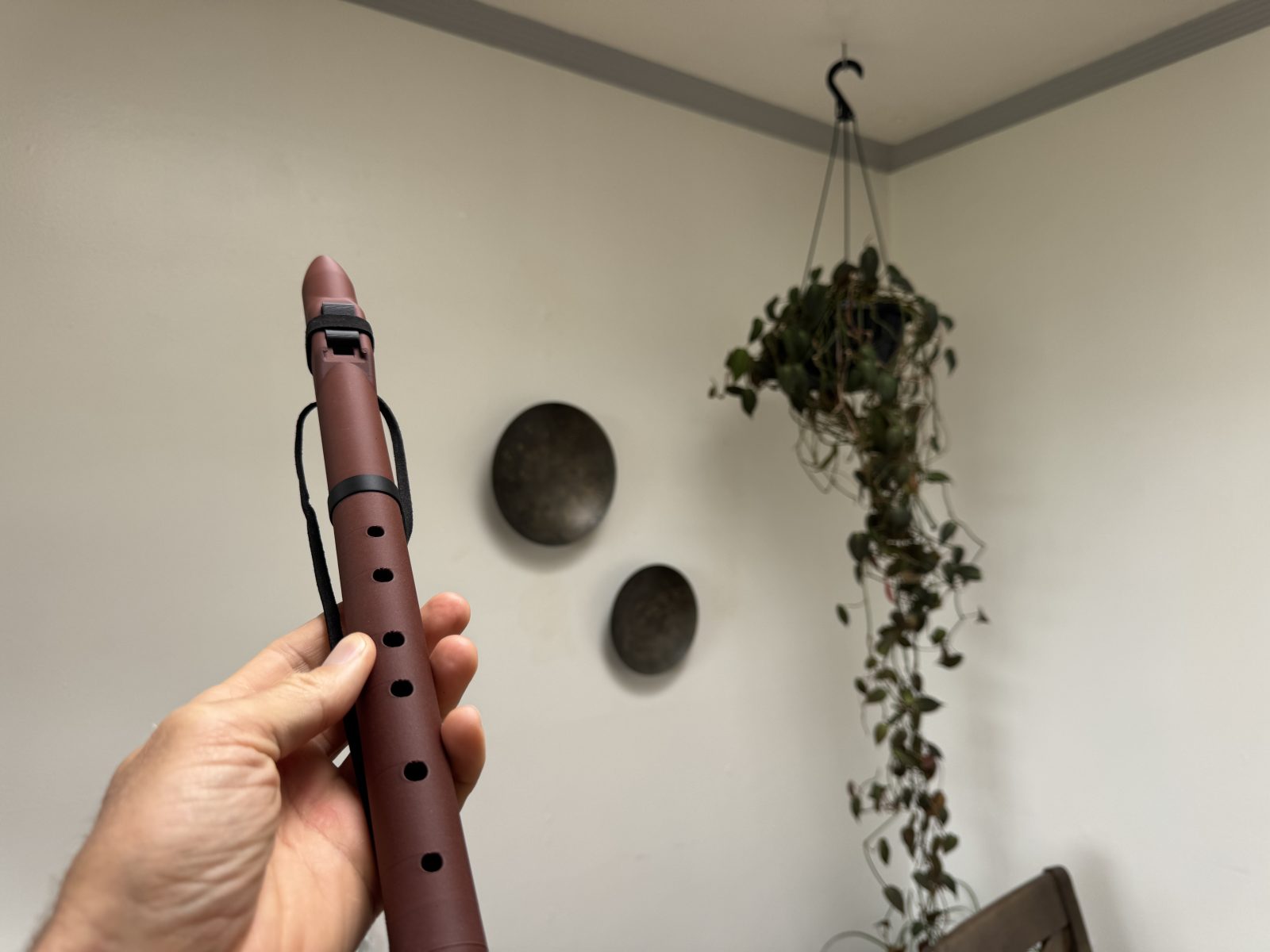 Full body of the A 432 Hz flute with finger holes visible